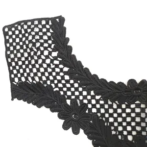 Detailed view of black water-soluble lace collar with 3D floral milk silk embroidery