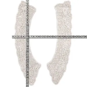 Detailed view of white cotton embroidery lace collar with vertical and horizontal rulers.
