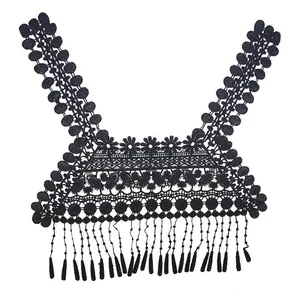 Detailed view of black water-soluble lace fake collar with embroidered fringe tassels