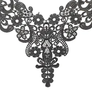 Detailed macro view of black floral guipure lace applique for DIY sewing projects