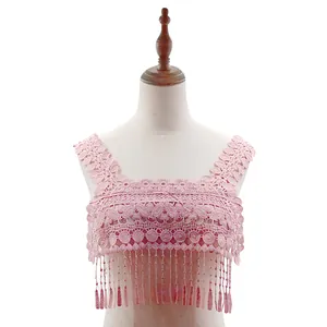 Close-up detail of a pink water-soluble lace collar featuring elegant fringe and embroidery