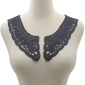 Elegant black water-soluble lace floral collar appliqué shown on a display mannequin.