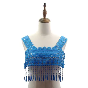 Detailed view of blue water-soluble lace collar with elegant hanging tassels