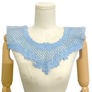 Close-up of light blue floral water-soluble lace collar with intricate embroidery detail