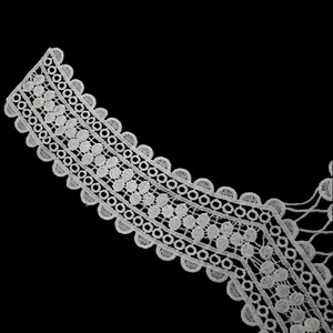 Detailed view of white water-soluble milk silk embroidered lace collar with hollow pattern