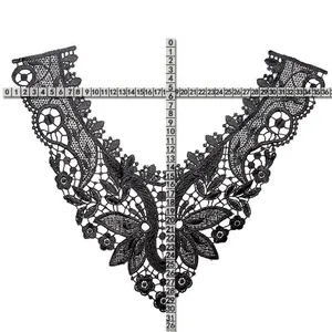 Detailed view of black lace embroidered V-neck collar showing size with measuring tape