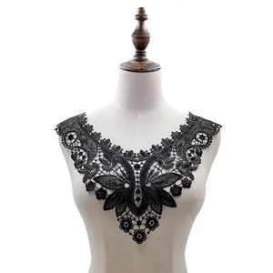 Detailed view of black water-soluble lace collar with intricate floral embroidery DIY