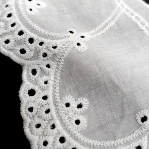 Macro detail view of white cotton broderie anglaise embroidery lace for DIY collars