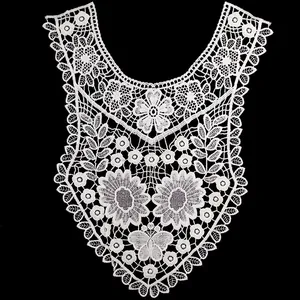 Detail view showing intricate white milk silk lace embroidery with floral and butterfly motifs