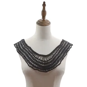 Detail shot of a vintage black hollow lace crochet collar applique on white mannequin
