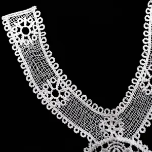 Detail of white water-soluble lace collar with intricate 3D hollow embroidery patterns
