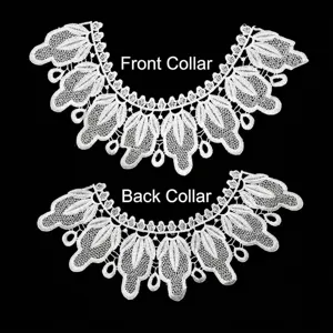 Detailed view of white water-soluble lace collar flowers with intricate embroidery
