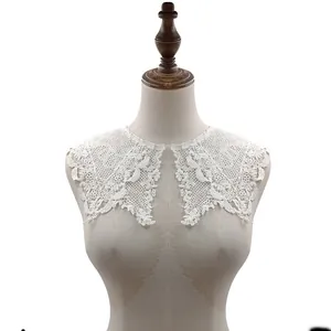 Detailed close-up showing white double-layered lace embroidered false collar on a mannequin