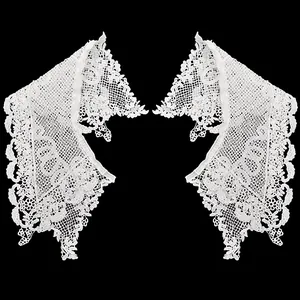 Close-up detail of white water-soluble lace embroidered fake collar for DIY projects.