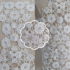 Detailed close-up of white milk silk water-soluble lace embroidery for fashion DIY collar
