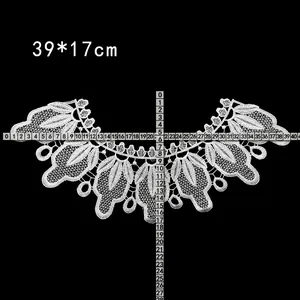 Detailed close-up of white water-soluble lace collar applique with 39x17cm measurement