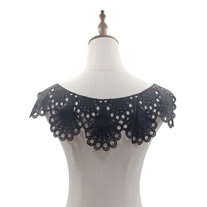 Detailed rear view of black water-soluble lace embroidery collar on a display mannequin
