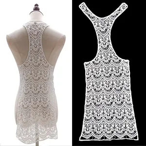 Close-up of white milk silk water-soluble lace embroidery patch with hollow pattern