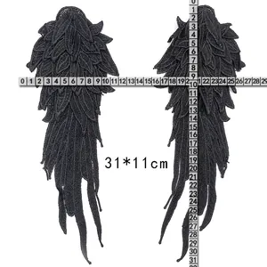 Detailed view of black angel wing lace embroidery patches with 31x11cm size measurement