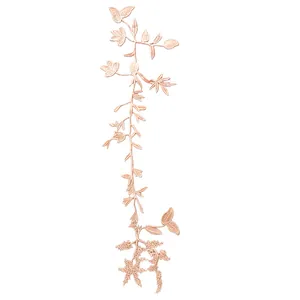 Detailed view of champagne floral lace embroidery applique for DIY wedding dress accessories.