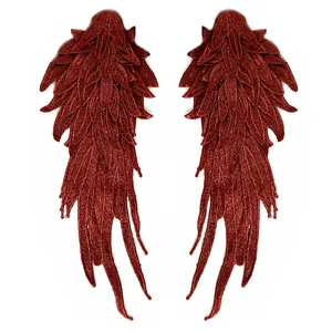 Detail view of dark red layered 3D embroidered angel wing patches for DIY garment decor