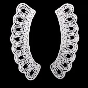 Detailed view of white water-soluble milk silk lace embroidery for shoulder collars