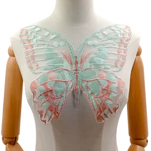 Detailed view of large butterfly embroidery patch on mesh for garment DIY
