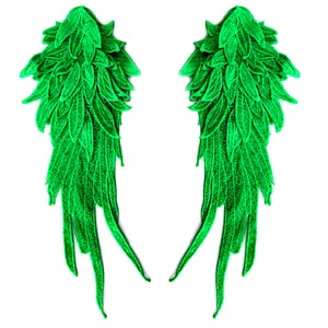 Close-up of vibrant green layered angel wing embroidery patches for garment DIY craft