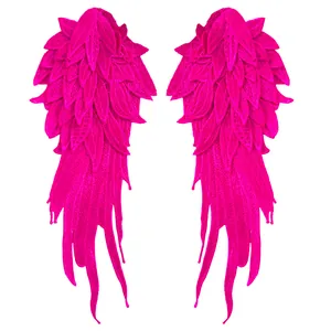 Detailed view of magenta layered wing embroidery lace patches for DIY crafts