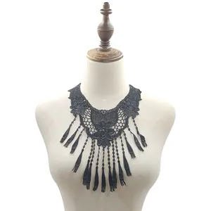 Detailed view of elegant black water-soluble lace tassel collar with hollow embroidery