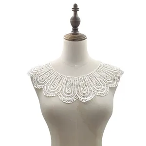 Close-up of a white milk silk embroidered hollow lace collar accessory for DIY clothing