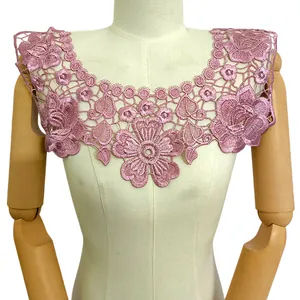 Detailed view of pink embroidered floral lace collar applique on a mannequin