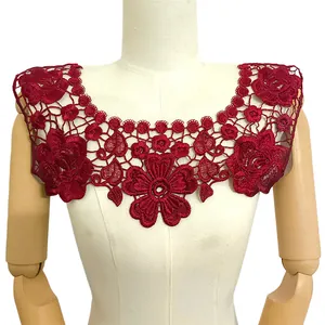 Detailed view of burgundy floral lace embroidered collar displayed on a cream mannequin torso
