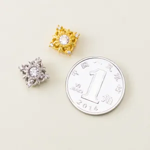 Close-up detail of 925 sterling silver square spacer beads with cubic zirconia inlay