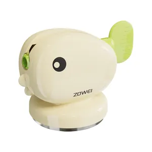Cute whale-shaped wall-mounted toothpaste dispenser with suction cup for home bathroom use