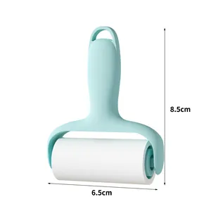 Detail view of mini portable sticky lint roller dimensions showing 8.5cm height and 6.5cm width