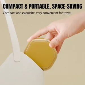 Compact hexagonal portable retainer case in mustard yellow being put into a travel bag