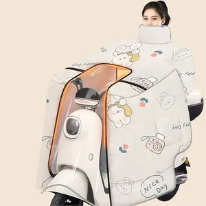 Manta cortavientos para scooter eléctrico con diseño de conejo y cámara de dibujos.