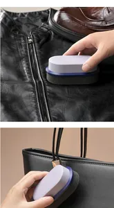 Portable shoe shine sponge brush used for cleaning leather jackets and handbags.