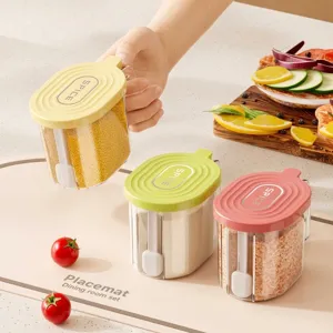 Set of three colorful spice jars with spoons and airtight lids for kitchen organization