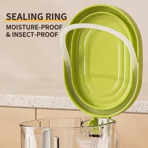 Clear kitchen seasoning jar with green lid and silicone sealing ring for moisture protection