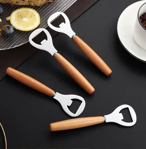 Detailed view of four stainless steel bottle openers with ergonomic wooden handles
