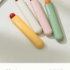 Detail of dopamine-colored portable cutlery storage cases in various bright and stylish colors