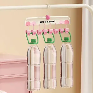 Multipurpose pink animal paw sock hanger with six strong clips for laundry drying