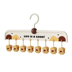 Multi-clip clothes hanger with cute animal paw clips for drying socks and underwear