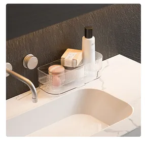 Detailed view of fluted transparent acrylic storage tray on a modern bathroom counter