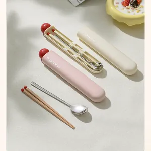 Portable stainless steel cutlery set with spoon, chopsticks and pink storage case
