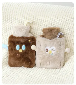 Two adorable plush hot water bottles featuring cute cartoon faces on a soft knitted background.