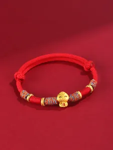 Bracelet en corde rouge tressé avec un joli pendentif serpent doré et symbole de chance