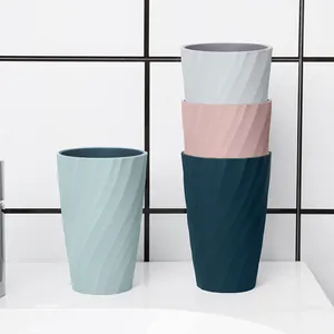 Premium thickened plastic toothbrush cups with spiral swirl design for modern bathroom use